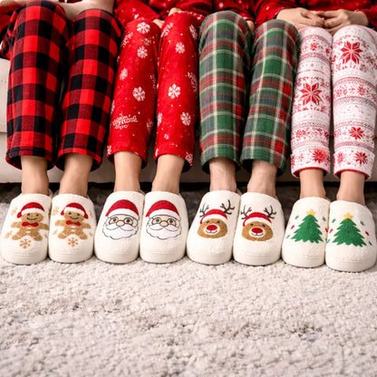 People wearing Christmas slippers pajamas with Christmas designs on a carpeted floor.