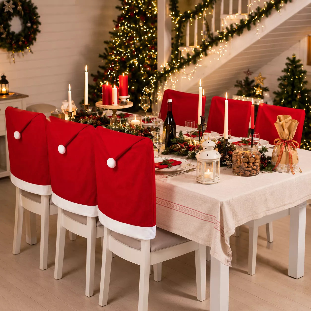 Red Santa hat Christmas chair covers on dining chairs