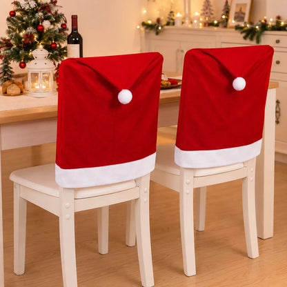 Santa hat chair cover slipped over a dining chair back