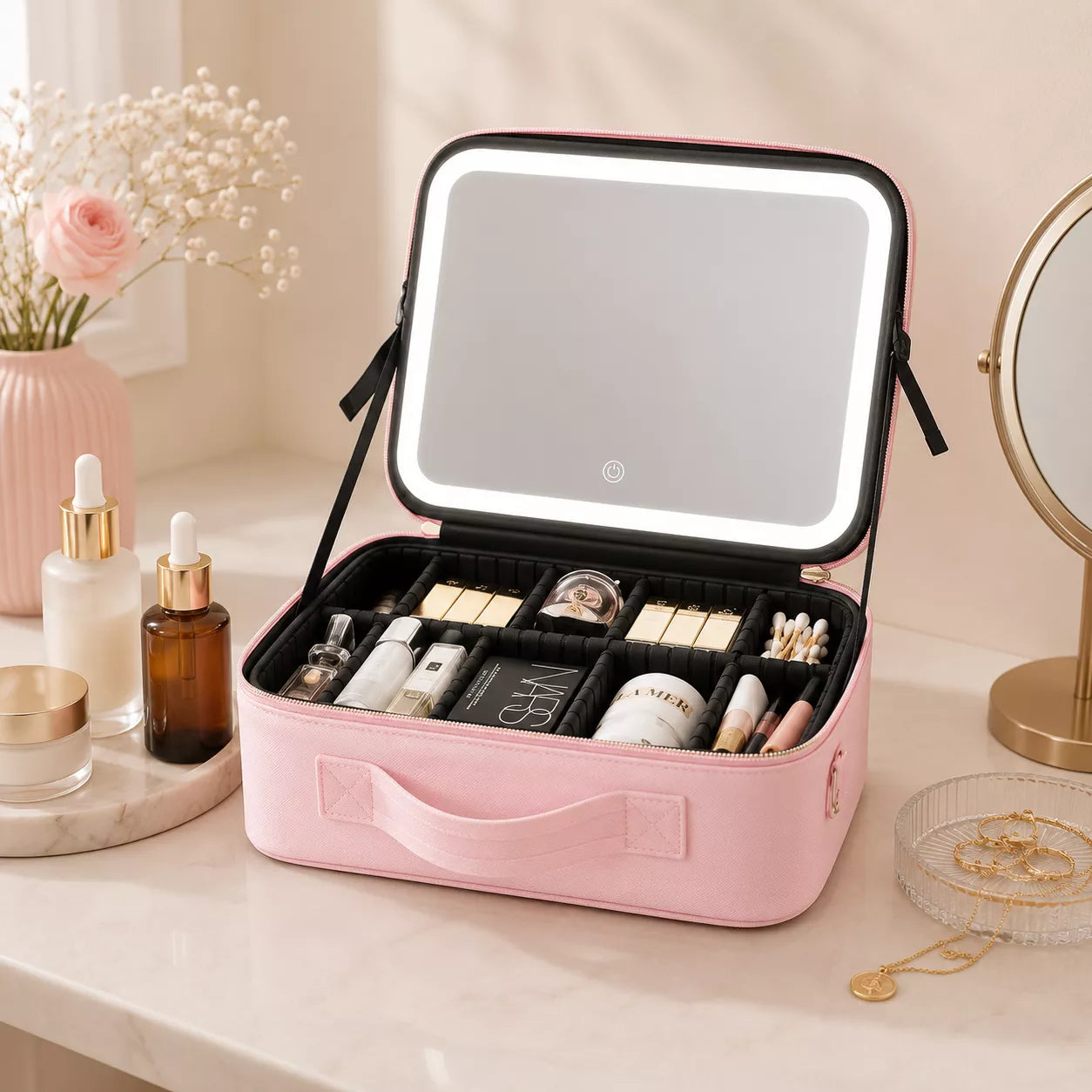 Packed travel makeup case with LED mirror holding makeup, skincare products, and beauty tools