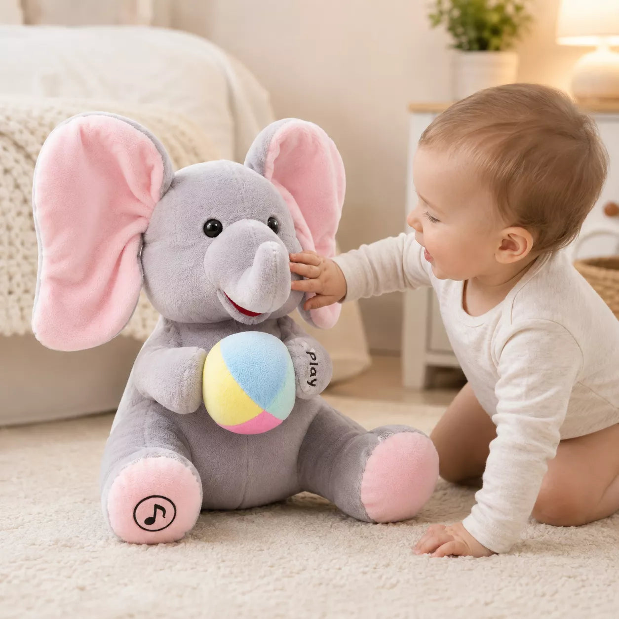 Interactive elephant toy showing its large moving ears