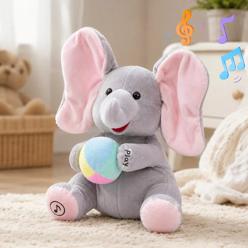Singing elephant toy with ears raised during interactive peekaboo play