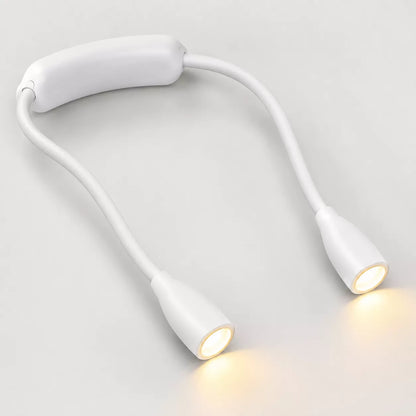A white dual-head flexible reading light with a padded headband, shown illuminated on a light gray background.