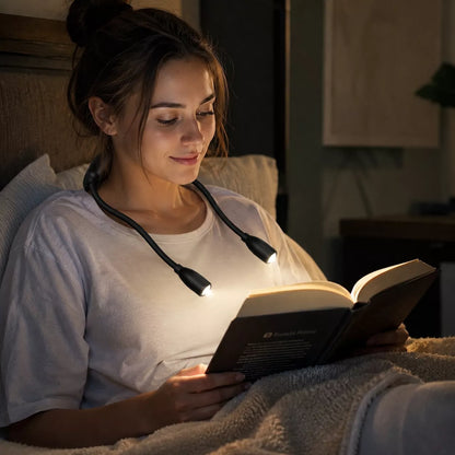 Hands free neck reading light worn while reading a book