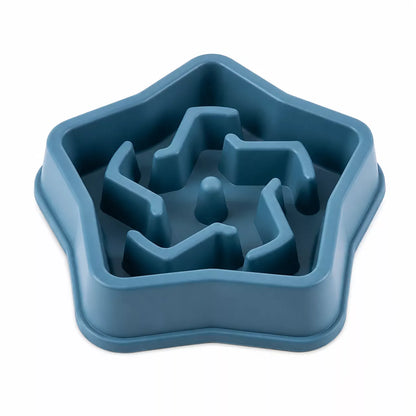 A blue star-shaped dog puzzle feeding bowl with a maze design