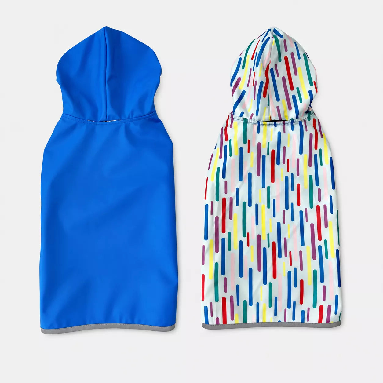 Two-sided dog rain jacket with lightweight waterproof shell and soft interior